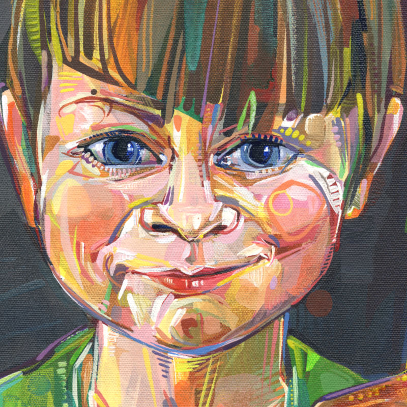 portrait of a little white kid painted with bright colors