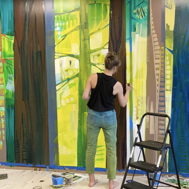 Gwenn Seemel, corporate mural artist at work