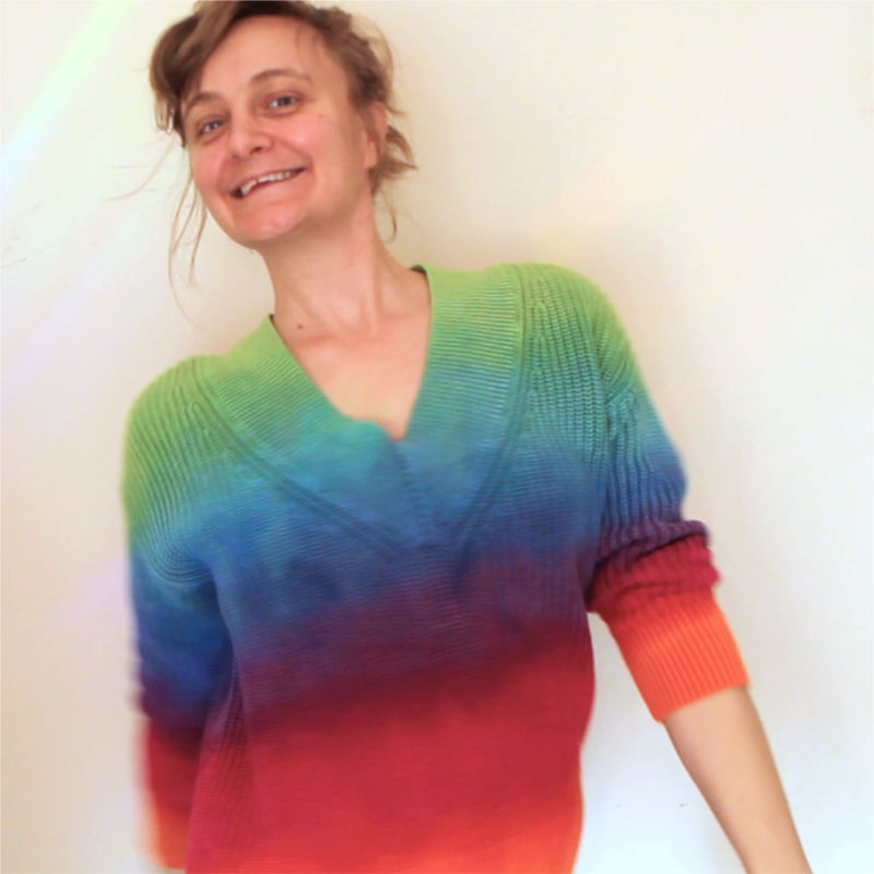 Gwenn Seemel in a DIY rainbow sweater