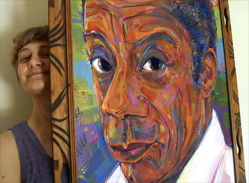 painter Gwenn Seemel with a painting of James Baldwin