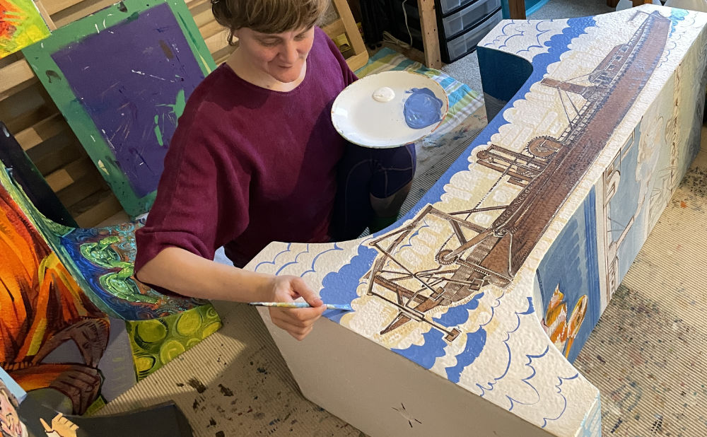 Gwenn Seemel painting the first steamboat for 52 Weeks of Firsts